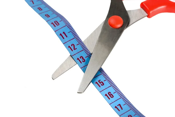 Измерение ножниц и синей ленты — стоковое фото