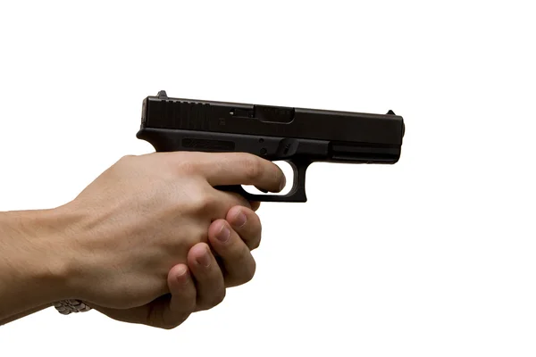 Пистолет в руке — стоковое фото