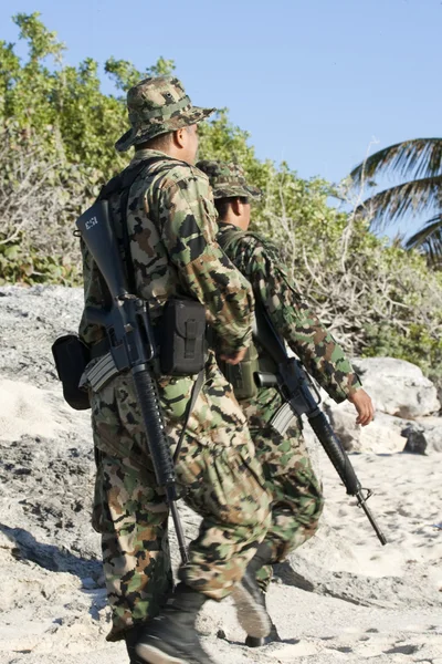 stock image MEXICO - FEBRUARY 7: Soldiers on duty checkinf the boarder on Fe