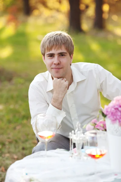 stock image Portrait of young man in the autumn park