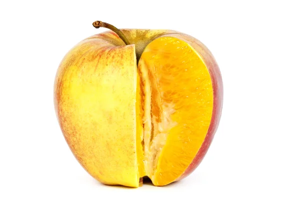 Naranja en manzana —  Fotos de Stock