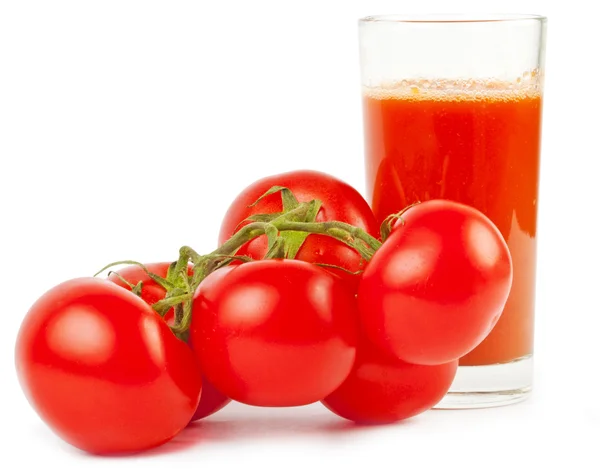 Tomatoes and juice — Stock Photo, Image