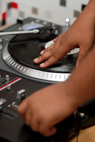 Hip-hop DJ scratching the record — Stock Photo, Image