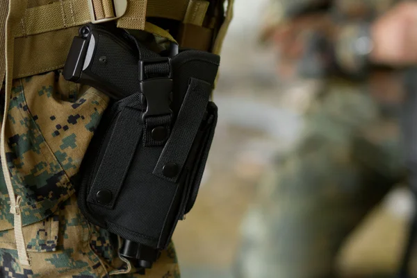 stock image Pistol in a gun holster on a belt