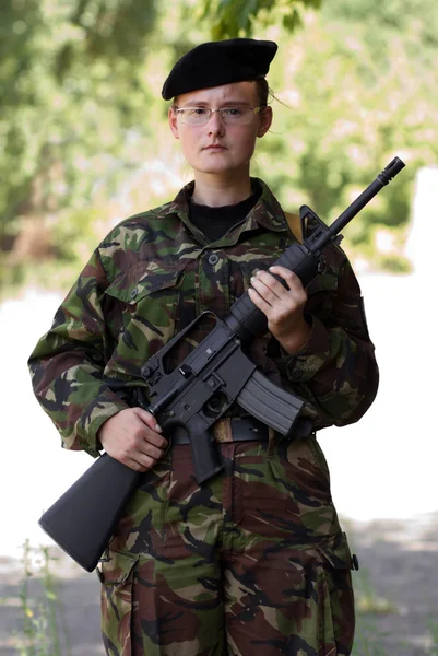 stock image Young female soldier on guard