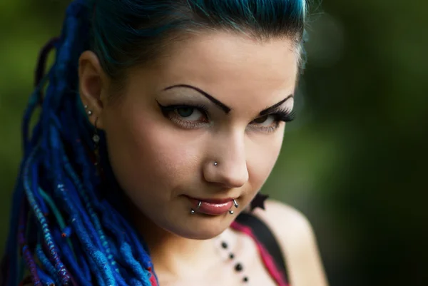 Pierced young girl with blue hair — Stock Photo, Image