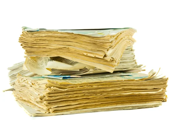 Stack of old newspapers isolated — Stock Photo, Image