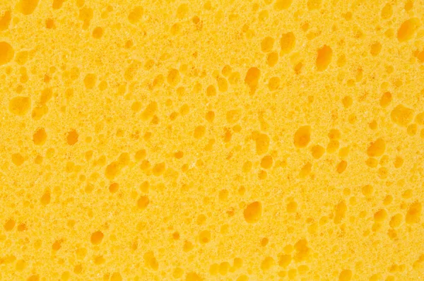 Zbliżenie żółty czyszczenia gąbki. — Zdjęcie stockowe