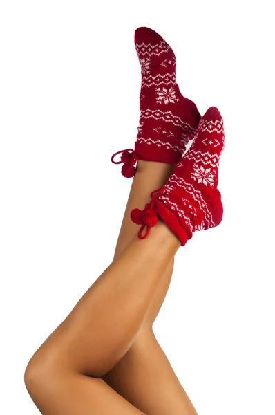 Beine langes Weibchen in gestreiften Socken isoliert — Stockfoto