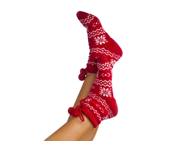 Piernas largas hembra en calcetines a rayas aislados — Foto de Stock
