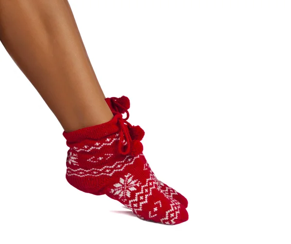 Benen vrouw in gestreepte sokken geïsoleerd — Stockfoto