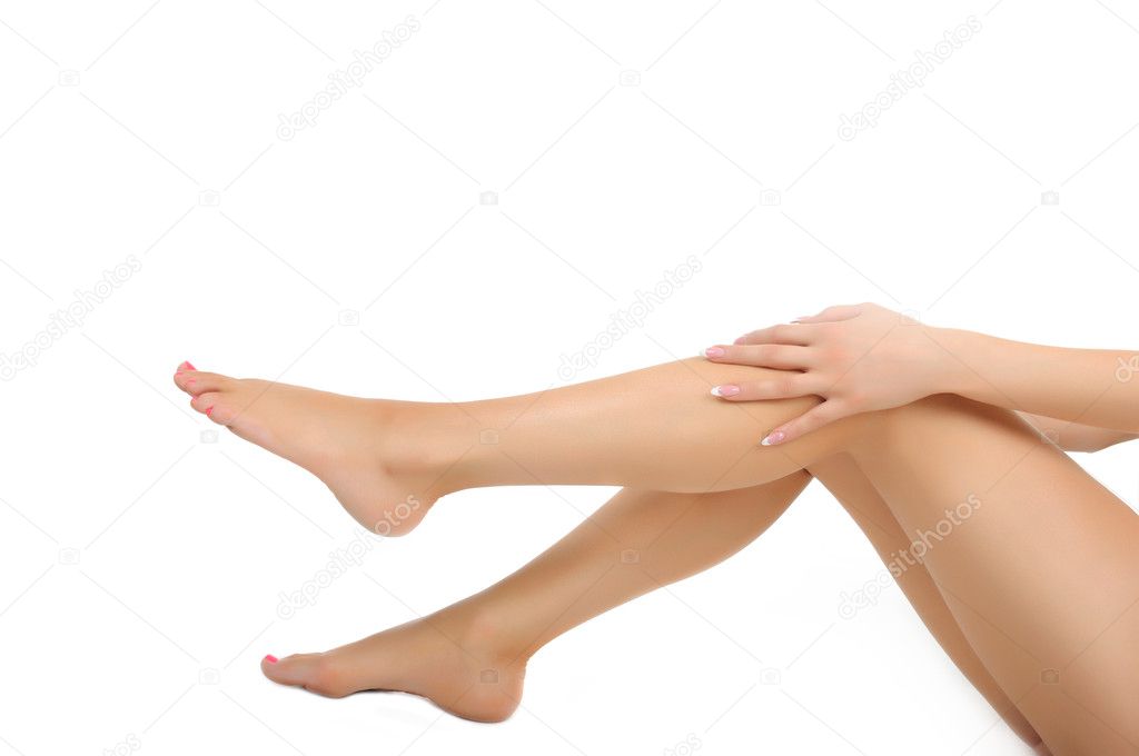 Legs bieng massaged with hands isolated