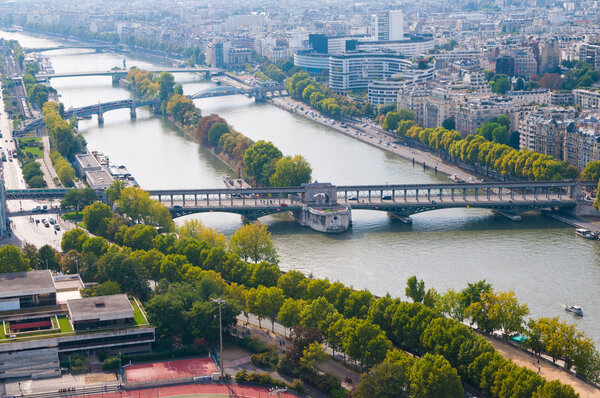 Aerial panoramic view of Paris and Seine river as seen from Eiffel Tower in Paris, France.