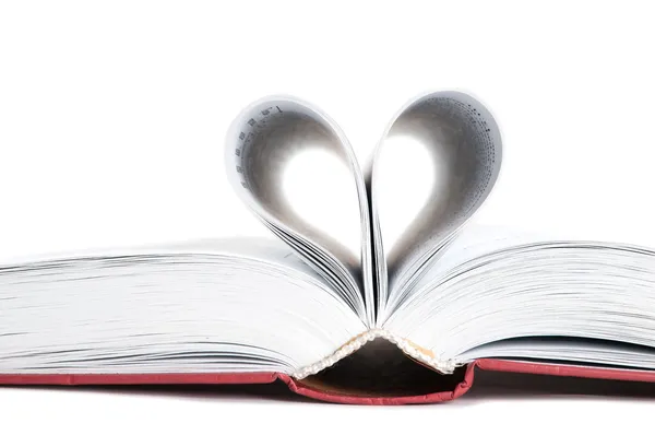 Stránky knihy zakřivené do tvaru srdce — Stock fotografie