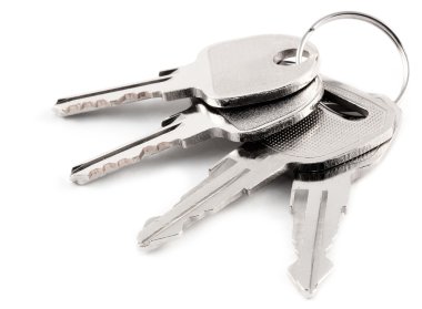 A bunch of keys isolated against a clean white background clipart