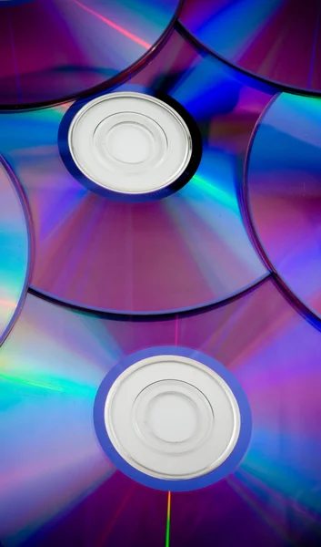 Háttérben a néhány színes CD-lemezek — Stock Fotó