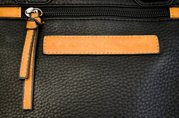 Black Zipper On A Leather Bag