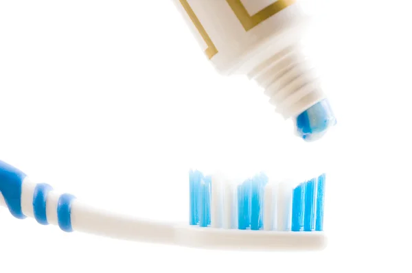 Spazzola dentale e tubo con pasta . — Foto Stock