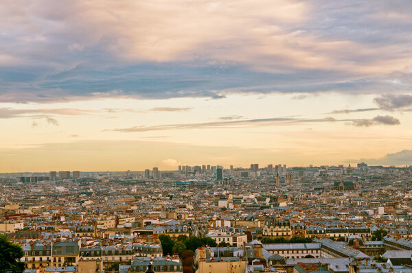 Paris skyline from the Sacre Coeur at a summer sunset.