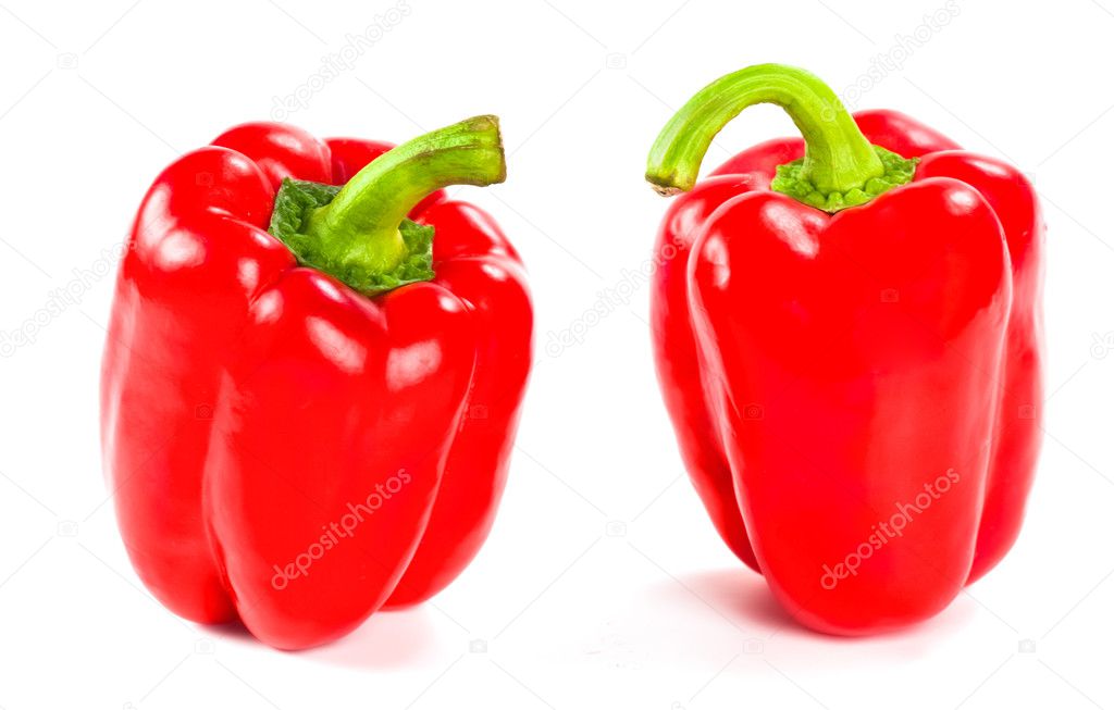 Two fresh red peppers