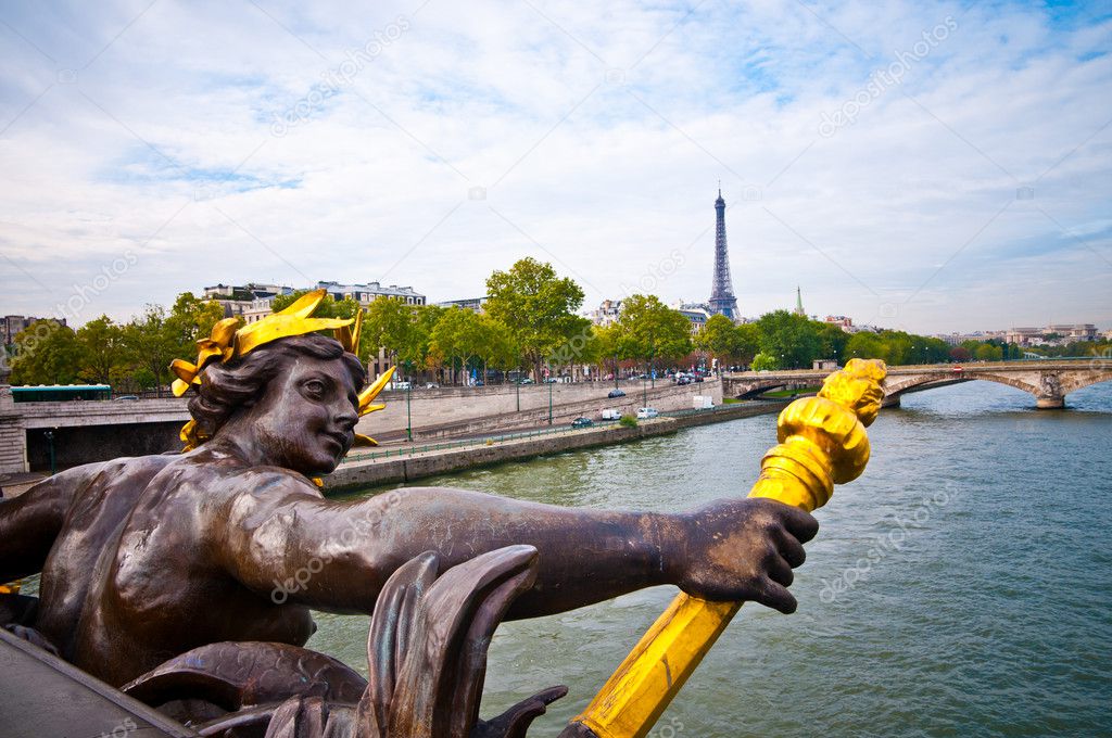 View on Seine River and Eiffel Tower from Alexander III bridge i