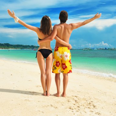 Couple on a beach clipart