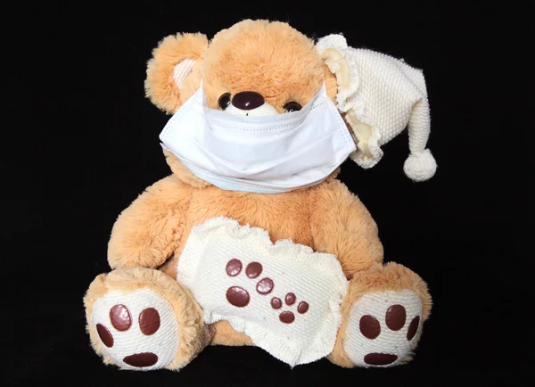 Teddy with mask — Stock Photo, Image