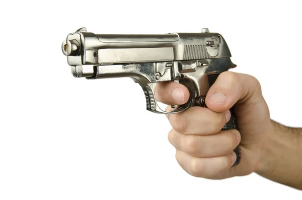 Zbraň v ruce na bílém pozadí — Stock fotografie