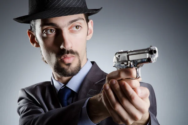 Ділова людина з ручним пістолетом — стокове фото