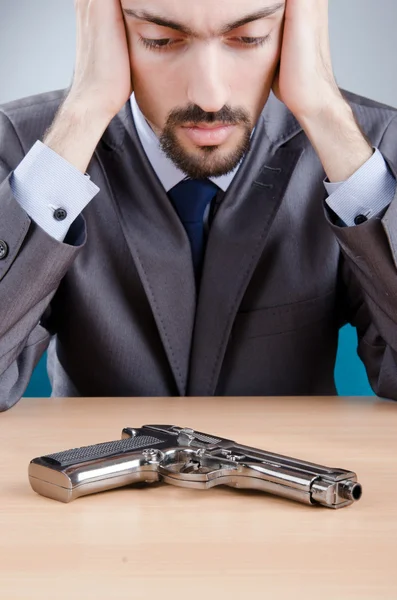 Businessman man with hand gun — Stock Photo, Image