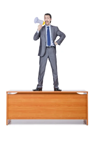 Geschäftsmann mit Lautsprecher am Schreibtisch — Stockfoto