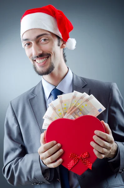Père Noël avec billets en euros — Photo