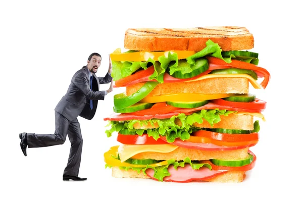 Homme et sandwich géant sur blanc — Photo