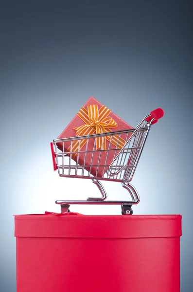 Christmas shopping concept with shopping cart Stock Photo