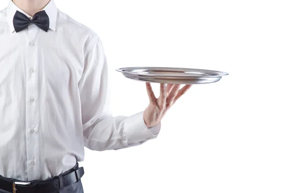 Young waiter with silver tray — Stock Photo, Image