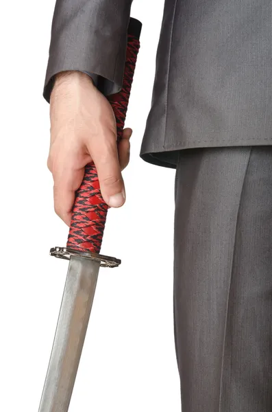 Бизнесмен с мечом на белом — стоковое фото