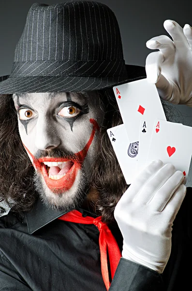 Joker con le carte in studio sparare — Foto Stock