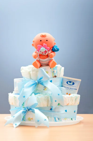 Cakes made of diapers on white — Stock Photo, Image