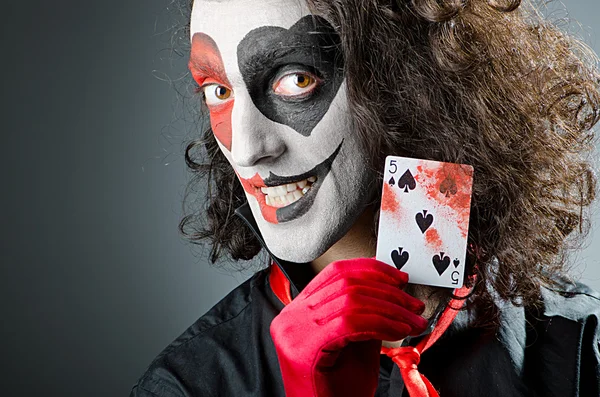 Joker met gezichtsmasker in studio — Stockfoto