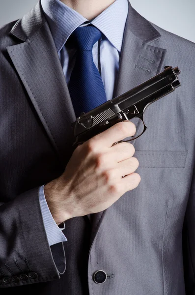Affärsman man med hand pistol — Stockfoto