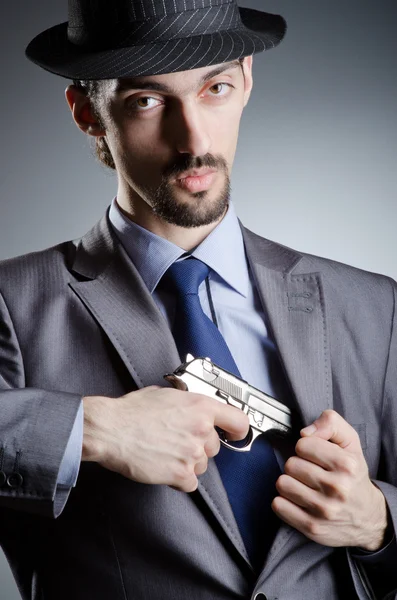 Ділова людина з ручним пістолетом — стокове фото