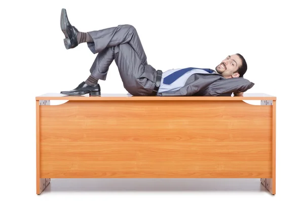 Spanie w tym biurko biznesmen — Zdjęcie stockowe