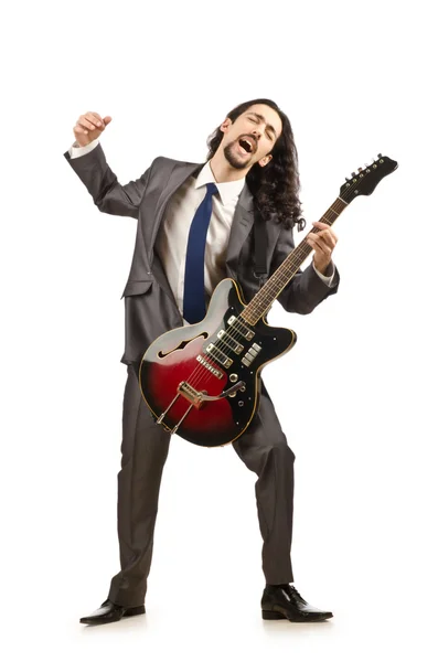 Podnikatel hraje na kytaru na bílém pozadí — Stock fotografie