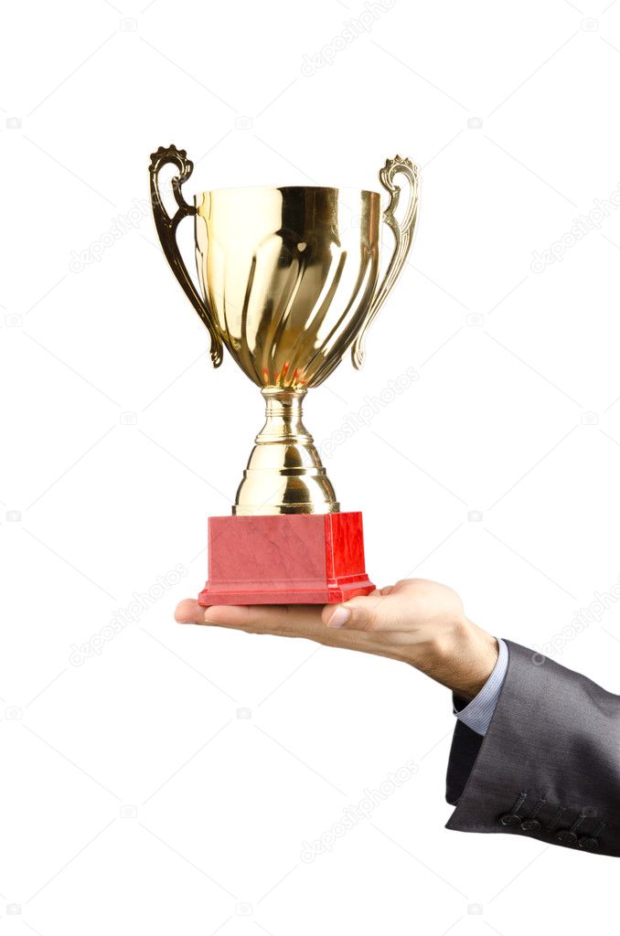Man being awarded with golden cup