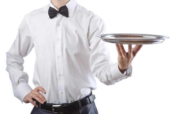 Young waiter with silver tray — Stock Photo, Image