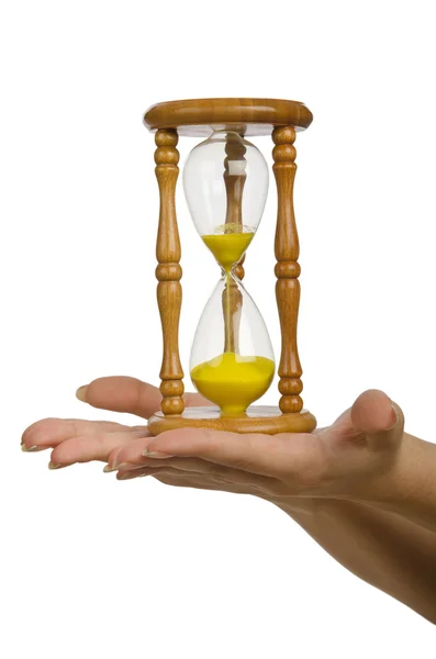 Hand holding hourglass on white — Stock Photo, Image