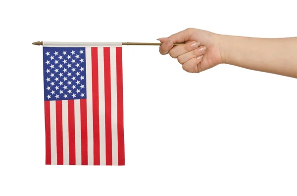 Mão segurando bandeira americana no branco — Fotografia de Stock