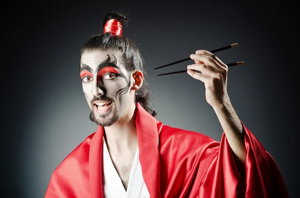 Japonský herec s hůlkami — Stock fotografie