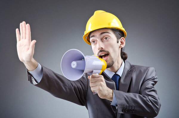 Man shouting and yelling with loudspeaker