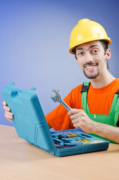 Reparateur mit seinem Werkzeugkasten — Stockfoto